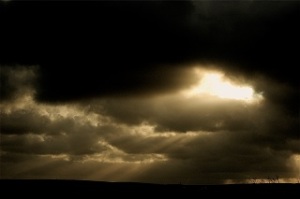 light through dark clouds